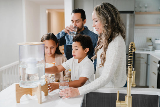 family drinking alkaline water